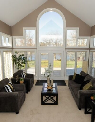 Staged sunroom in cream and grey by Cindy Lutes, Total Home
