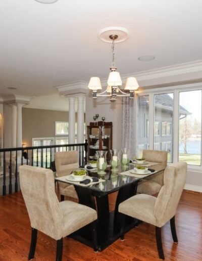 Staged dining room in cream and grey by Cindy Lutes, Total Home