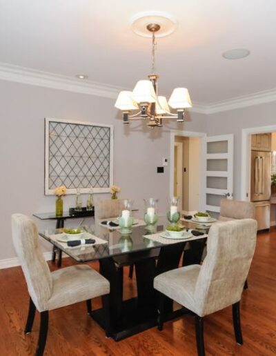 Staged dining room in grey and cream by Cindy Lutes, Total Home