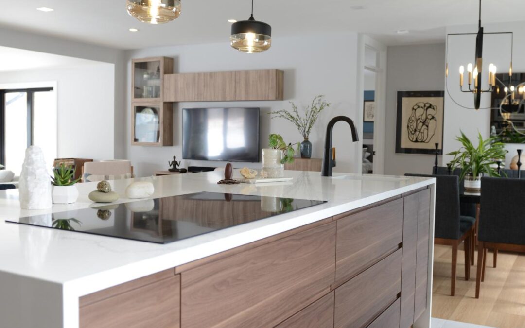 Modern kitchen renovation with large central island and pendant lighting — Kemptivlle interior design by Total Home