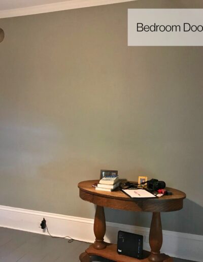 Interior wall with small table before bathroom renovation in Kemptville